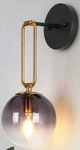 Uolfin 14.5 In. 1-LIGHT Black And Gold Wall With Gradient Purple Glass. Fixed Price $52.20.