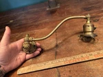 Early American Lighting Single Ornate Swivel Arm Lamp Faries Era Geco Oc White. Fixed Price $225.00.