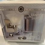 Hampton Bay Single Vanity Light Brushed Nickel Model #394 547 Brand New Box. Fixed Price $39.99.