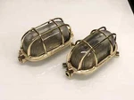 Nautical Brass Oval Wall Sconce Industrial Bulkhead Cage Light Fixture Set Of 2. Fixed Price $349.00.