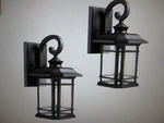 Jazava Black Outdoor Hardwired Wall Lantern Sconce With Clear Seeded Glass 2PK. Fixed Price $67.96.