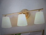 Uolfin Modern Farmhouse Gold Wall Sconce 20.1 In. 3-LIGHT Bathroom Vanity. Fixed Price $47.45.