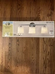 Hampton Bay 3-LIGHT Brushed Nickel Vanity Fixture Opal Glass Shades #1001553704. Fixed Price $34.99.