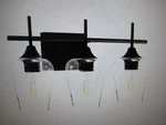 Merra 3-LIGHT Black Bathroom Vanity With Seeded Glass Shades. Fixed Price $31.96.