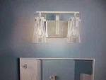 Home Decorators Clermont 14.75 In. 2-LIGHT Brushed Nickel Bathroom Vanity. Fixed Price $31.95.