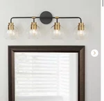 Home Decorators Collection Lawrence 4 Light Aged Bronze And Brass Vanity. Fixed Price $69.00.