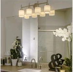 Design House 556217 Aubrey 4 Light 11" Tall Wall Sconce - Nickel. Fixed Price $23.40.