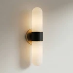 Possini Euro Riegel 15"H Black Gold Fluted Glass 2-LIGHT Wall Sconce. Fixed Price $174.99.