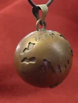 Vintage World Globe Chime Pendant - 1" Copper Toned Black Cord. Fixed Price $20.00.