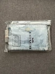 Coach CEF82 Corner Zip Wristlet Light Indigo Denim With Charms New Nwt. Fixed Price $62.65.