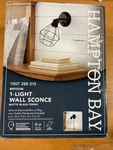 Hampton Bay 65740 Bryson 1-LIGHT Matte Black Wall Sconce. Fixed Price $14.99.