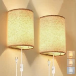 Xieyor Plug In Wall Sconce, Colors 6.9"L 5.3"W 9.8"H, Beige. Fixed Price $36.74.