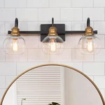 Lnc 22.5 In. 3-LIGHT Aged Brass & Black Vanity W/ Clear Glass Globe Shades. Fixed Price $37.99.