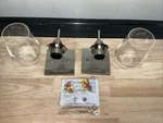 Pair (2) Merra 1-LIGHT Brushed Nickel Wall Sconce Vanity With Glass Shade. Fixed Price $44.99.