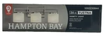 Hampton Bay Tustna 26 In. 3-LIGHT Brushed Nickel Bathroom Vanity W Shade. Fixed Price $59.99.