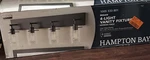 Hampton Bay Regan 29.1" 4-LIGHT Espresso Vanity W Clear Glass-missing Part. Fixed Price $30.00.