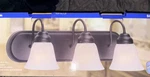 Hampton 3-LIGHT Vanity Wall Fixture Oil Rubbed Bronze Bell Glass 7460-113. Fixed Price $65.00.