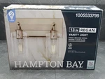 Hampton Bay Regan 12.75 In. 2-LIGHT Brushed Nickel Vanity With Clear Glass. Fixed Price $49.99.
