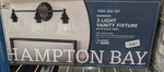 Hampton Bay Marsden 23.5 In. 3-LIGHT Matte Black Vanity W/clear Glass Shades. Fixed Price $31.34.