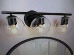 Uolfin Industrial Black Bathroom Vanity Light, 21.5 In. 3-LIGHT Modern Sconce. Fixed Price $47.96.