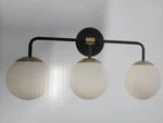 Luminosa 23 In. W 3-LIGHT Black & Gold Finish Vanity Frosted Opal Shades. Fixed Price $55.00.