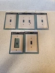 3 Single Liberty Wall Plates, 1 Double Switch, Outlet New. Fixed Price $20.23.