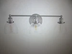 Home Decorators Evelyn 26.75 In. 3-LIGHT Brushed Nickel Industrial Vanity. Fixed Price $35.10.