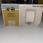Hampton Bay 1-LIGHT Brushed Nickel Wall Sconce With Opal Glass Shade. Fixed Price $38.99.