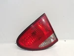 1999-04 Oldsmobile Alero Passenger Right Tail Light Lid Mount. Fixed Price $24.50.