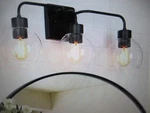 Zevni Modern 24.5 In. 3-LIGHT Matte Black Bathroom Vanity With Clear Glass. Fixed Price $65.50.