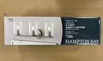 Hampton Bay Champlain 22.375 In. 3-LIGHT Brushed Nickel Bathroom Vanity. Fixed Price $38.98.