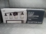 Hampton Bay Southbourne 28IN 4-LIGHT Matte Black Vanity W Open Steel Cage. Fixed Price $42.99.
