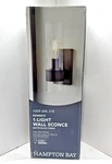 Hampton Bay Denbeck Matte Black 1-LIGHT Wall Sconce W/ Clear Glass Shade. Fixed Price $12.97.
