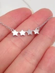 925 Sterling Silver Cz Dainty Star Pendant Necklace Four 19MM X4MM 17.25". Fixed Price $35.98.