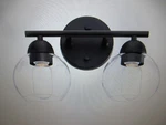 Uixe 13.33 In. 2-LIGHT Matte Black Bathroom Vanity With Clear Glass Shades. Fixed Price $22.75.