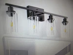 Yansun 32 In. 4-LIGHT Industrial Matte Black Vanity W Clear Glass Shades. Fixed Price $56.00.