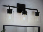 Zevni Modern 3-LIGHT Matte Black Wall Sconce With Clear Dome Glass Shade. Fixed Price $75.95.