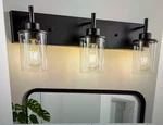 Goyeel Lunvera 23.62 In 3-LIGHT Black Farmhouse Clear Glass Bathroom Vanity. Fixed Price $34.39.